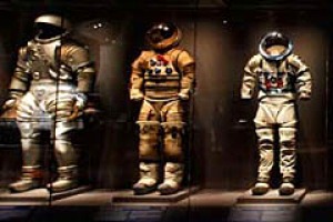Cosmic fashion ... space suits on display at the Kennedy Space Centre.