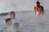 Tourists bathe in hot springs near the small village of Agua Brava, more than 4000 meters above sea level, in the Uyuni ...
