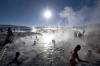 Tourists bathe in hot springs near the small village of Agua Brava, more than 4000 meters above sea level, in the Uyuni ...
