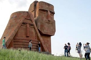 Tourists visit Grandmother and Granfather monument outside city of Stepanakert in Armenian-controlled Azerbaijani region ...