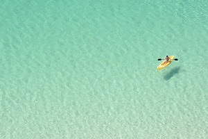 A kayaker enjoys the water in Panama City Beach, Florida.