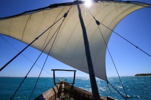 The dhow's sail full of breeze.