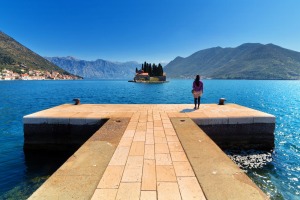 Tourist on island off coast of Perast, Montenegro