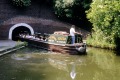 Barges at the Dudley Black Country Museum in England allow visitors to explore rock formations, limestone mines, branch ...