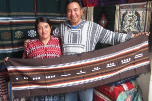 Miguel and Racquel Hernandez with Miguel's hand woven crafts.