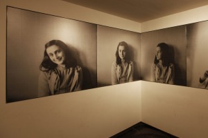 Portraits of Anne Frank in the introduction room.