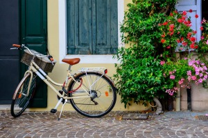 A more traditional pushbike in the colourful town of Caorle, Italy.