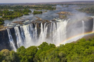 The Zambezi and the 1.7-kilometre-wide waterfall form a border between Zimbabwe and Zambia, often causing visitors to ...