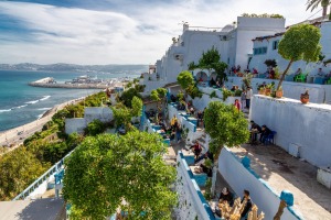 Café Hafa, a former hangout for the Beatles and the Rolling Stones, where tiered terraces stare across the Strait of ...