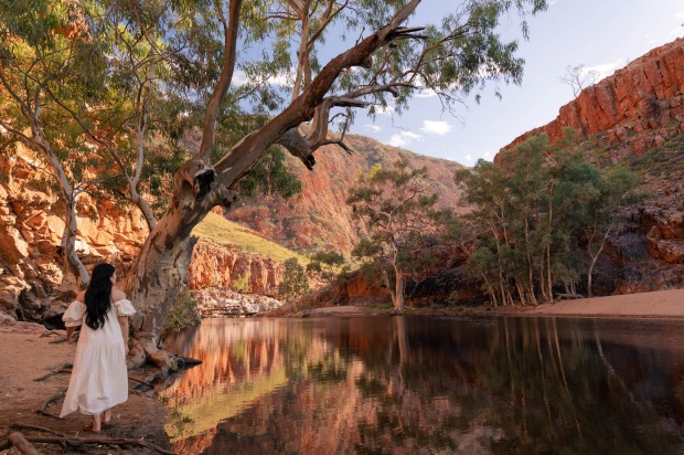 Ormiston Gorge offers contrast between the spectral white trunks of the ghost gums and the eye-watering blue of the ...