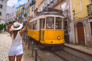 The popular Tram 28 that winds its way along the hilly streets of Alfama and Graça is packed like a Portuguese sardines ...