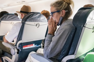 Cabin crew need to get passengers to wear their masks, especially if they are coughing and sneezing during a flight, ...