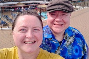 Husband and wife Angelyn and Richard Burk aboard a Carnival Cruise Line ship in March 2022. 