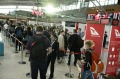 Qantas passengers queue at Sydney Airport last Friday.