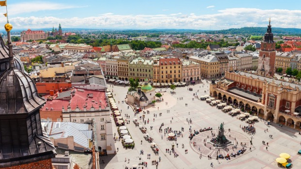 Rynek Glowny, in Krakow, Poland, is the world's largest medieval marketplace – a lively area surrounded by historic ...