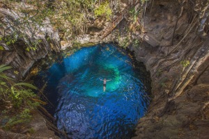 Swimming in a cenote in Mexico with G Adventures.