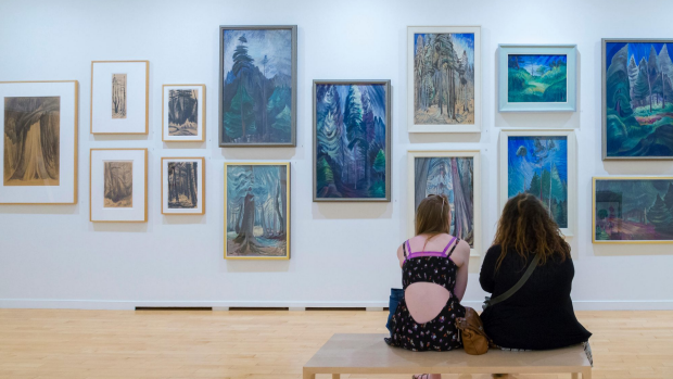 F29P5G Women enjoying Emily Carr paintings in gallery at Vancouver Art Gallery, Vancouver, British Columbia, Canada tra15-sixbestArt