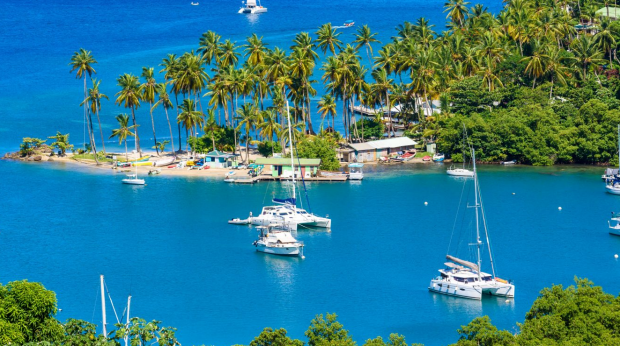 MCG3TA Marigot Bay, Saint Lucia, Caribbean. Tropical bay and beach in exotic and paradise landscape scenery. Marigot Bay is located on the west coast of the  *** fee applies ***satjan26coverÃÂ Caribbean : The last great tropical paradise ; text by Steve McKenna**** one time use only ***
