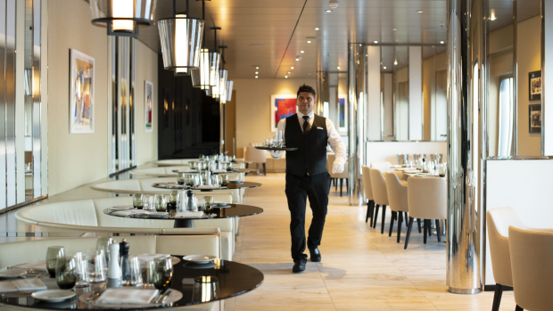 SatNov27Cover
A waiter about the luxurious Scenic Eclipse expedition cruise ship which features up to 10 different dining experiences from casual to formal.
Photo: supplied
